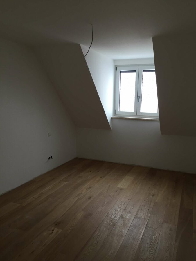 Neubau: DG-Wohnung mit gr. Loggia in der Wohnstadt Abensberg, sofort beziehbar - Schlafzimmer